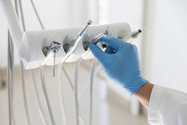 Professional Invisalign Clear Aligners technician working in Linden, TN